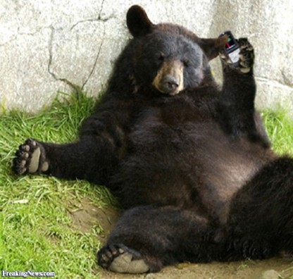 Yes, I actually found a picture of a bear with a phone.
